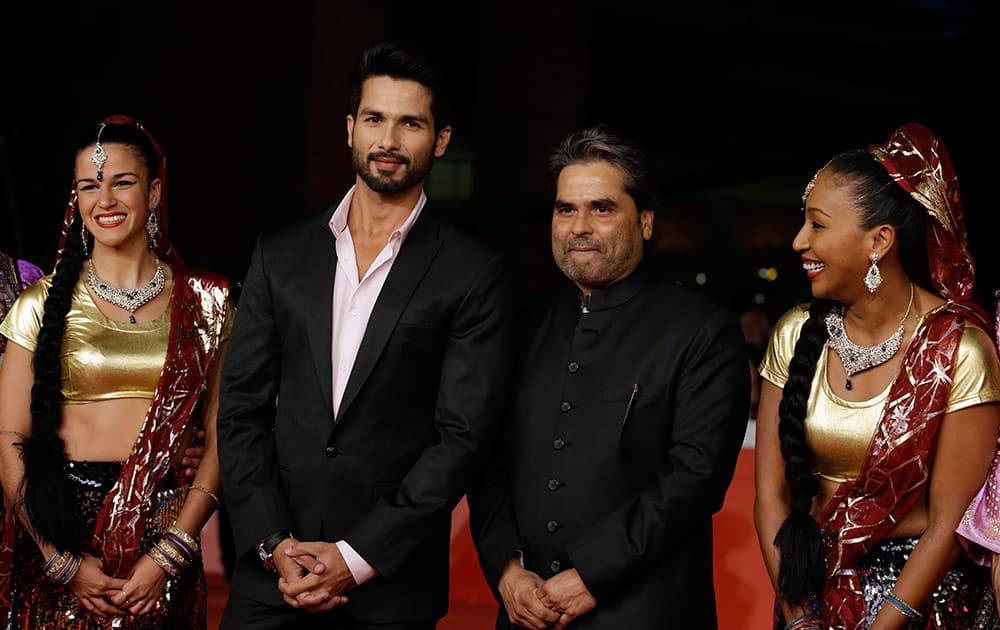 Shahid Kapur and director Vishal Bhardwaj pose for photographers on the red carpet on the occasion of the screening of the movie Haider during the 9th edition of the Rome Film Festival in Rome.