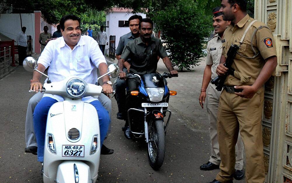 Union Minister for Transport and Shipping Nitin Gadkari leaves after meeting RSS Chief Mohan Bhagwat at RSS headquarters.