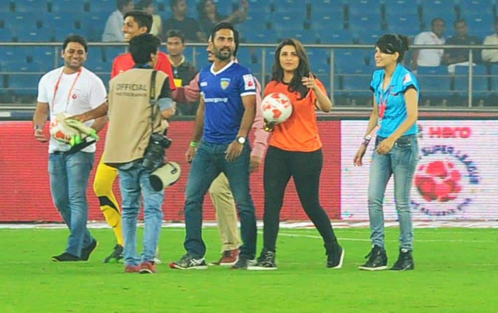 Dinesh Karthik and Parineeti Chopra during a match between Delhi Dynamos and Chennaiyin FC in Indian Super League (ISL) football match in New Delhi.