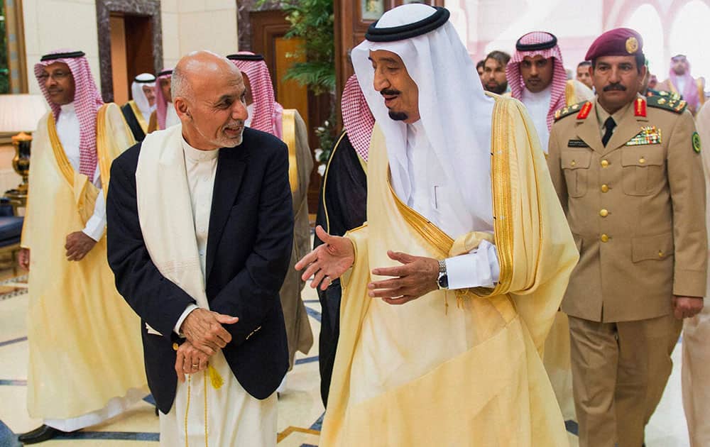 In this photo provided by the Saudi Press Agency, Saudi Arabias Crown Prince Salman bin Abdulaziz Al Saud, center, talks with Afghanistans President Ashraf Ghani Ahmadzai in Riyadh, Saudi Arabia.