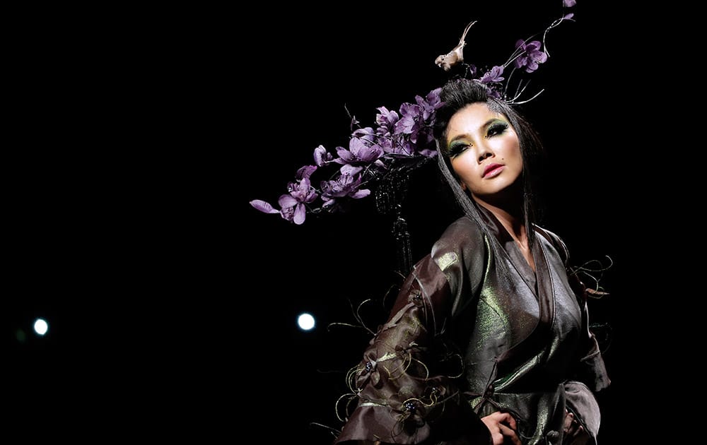 A model presents a creation at MGPIN 2015 Mao Geping Makeup Trends Launch collection during China Fashion Week in Beijing, China.