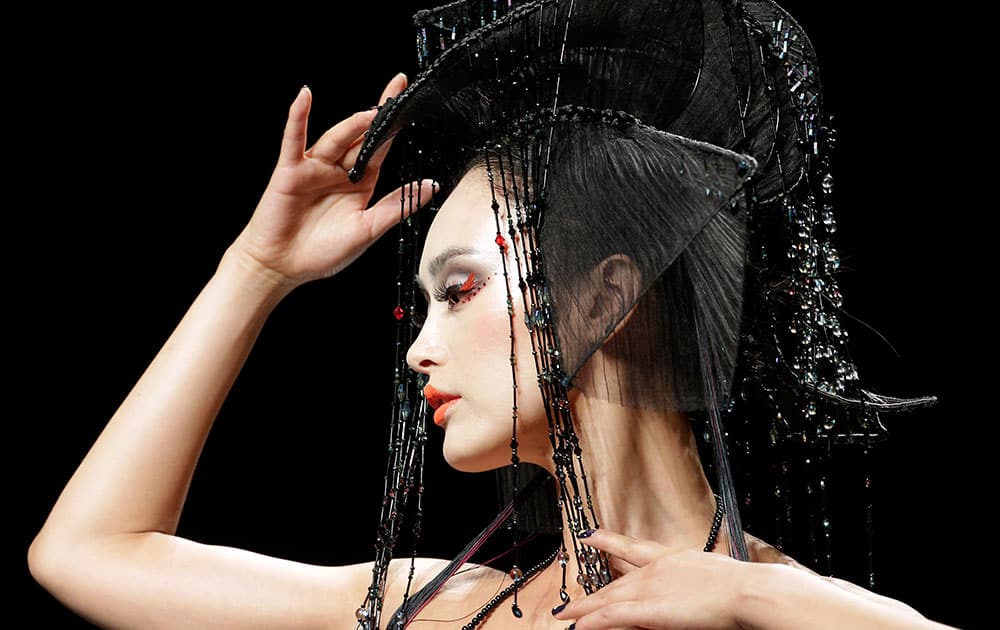 A model presents a creation at MGPIN 2015 Mao Geping Makeup Trends Launch collection during China Fashion Week.