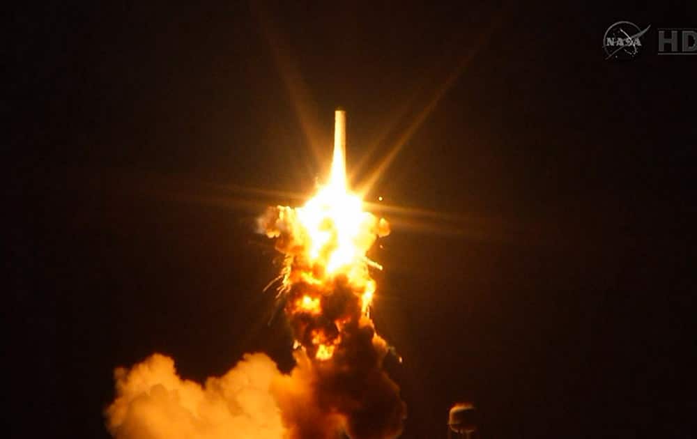 This image taken from video provided by NASA TV shows Orbital Sciences Corp.'s unmanned rocket blowing up over the launch complex at Wallops Island, Va., just six seconds after liftoff.