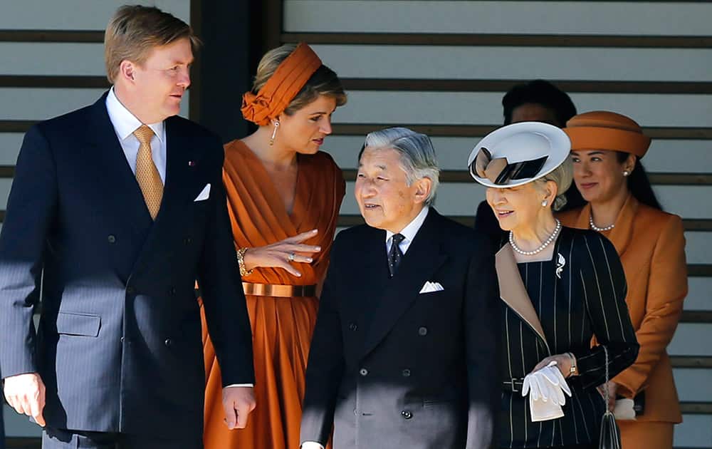 King Willem Alexander and Queen Maxima of the Netherlands are escorted by Japan's Emperor Akihito and Empress Michiko, as Crown Princess Masako, follows behind, during a welcome ceremony at the Imperial Palace in Tokyo.