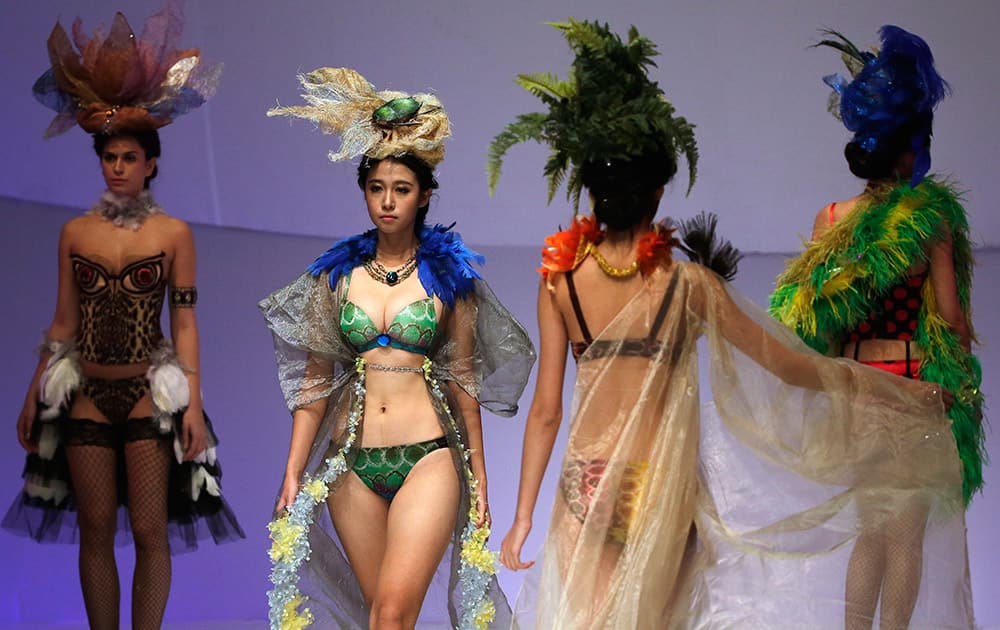 Models present creations during the Ordifen Cup China Lingerie Design Contest at China Fashion Week in Beijing, China.