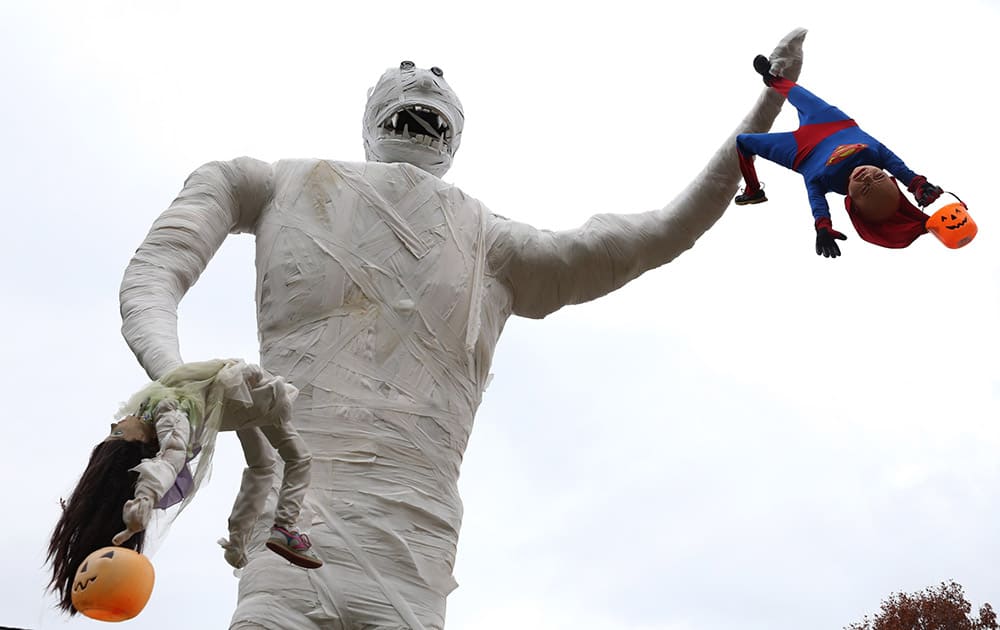 Richard Underly's giant mummy stands in front of his house in Portage, Mich. At 23 feet high, the mummy is nearing twice the size as last year's Halloween decoration.