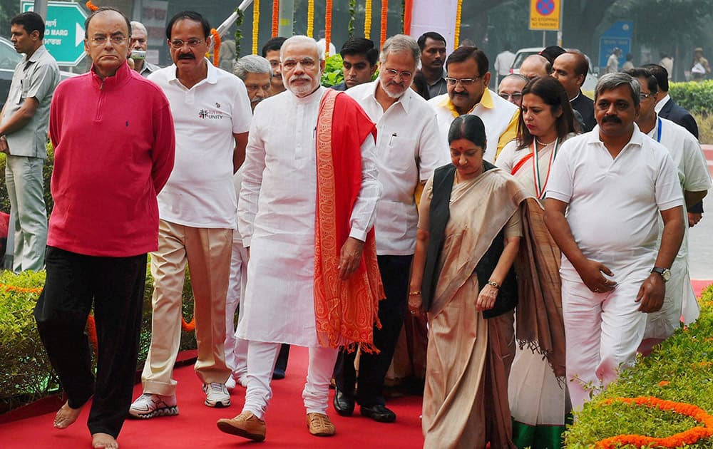 Prime Minister Narendra Modi along with Union ministers Sushma Swaraj, Arun Jaitley, Venkaiah Naidu, Delhi Lt Governor Najeeb Jung and others arrives to pay tribute to Sardar Vallabhbhai Patel on the occasion of his birth anniversary at Patel Chowk in New Delhi.
