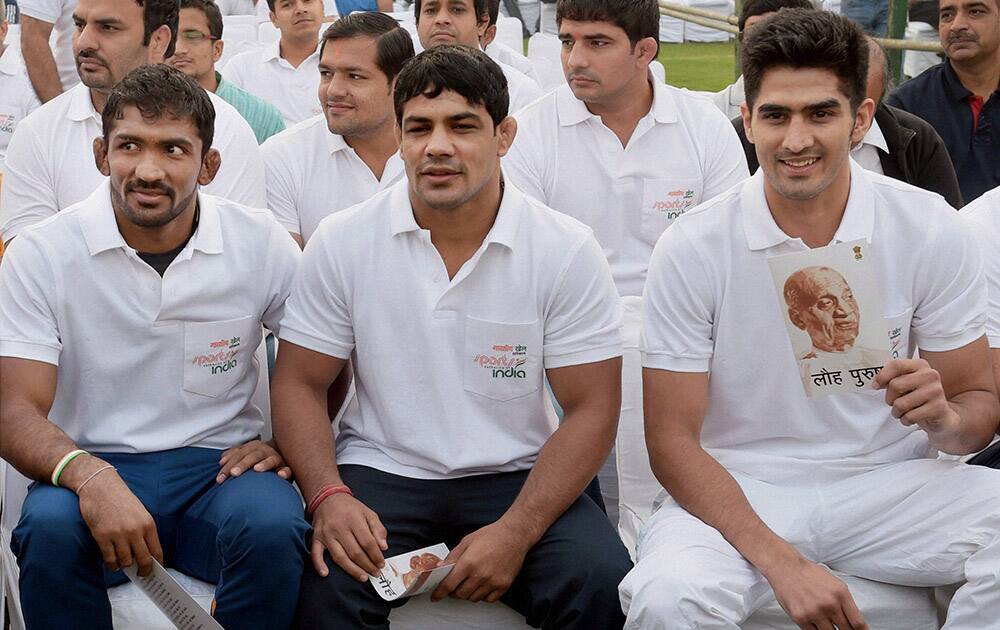 Sportspersons Vijender, Sushil Kumar and Yogeshwar Dutt during the Run for Unity at Rajpath on the occasion of Sardar Vallabhbhai Patels birth anniversary in New Delhi.