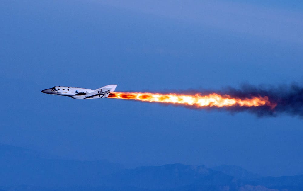 This photo provided by Virgin Galactic shows Virgin Galactic's SpaceShipTwo under rocket power, over Mojave, Calif. Virgin Galactic has reported an unspecified problem during a test flight of its SpaceShipTwo space tourism rocket. 