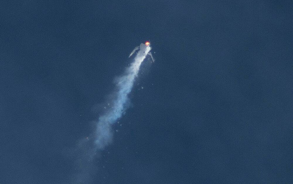 The Virgin Galactic SpaceShipTwo rocket separates from the carrier aircraft prior to it exploding in the air during a test flight. The explosion killed a pilot aboard and seriously injured another while scattering wreckage in Southern California's Mojave Desert, witnesses and officials said.