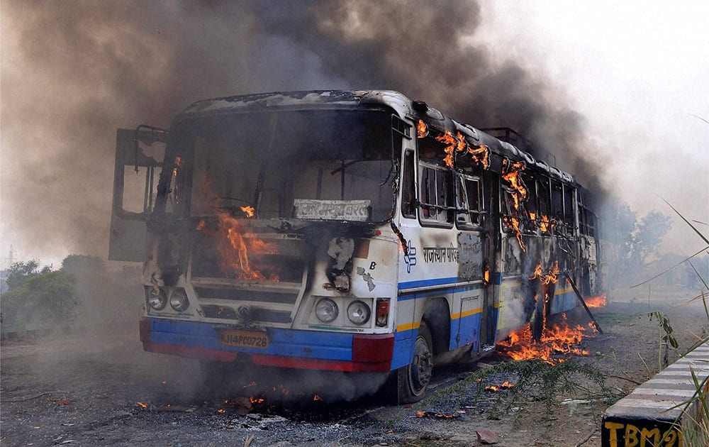 A roadways bus that was burnt by farmers at Gokul Baraj during a protest demanding land compensation in Mathura.