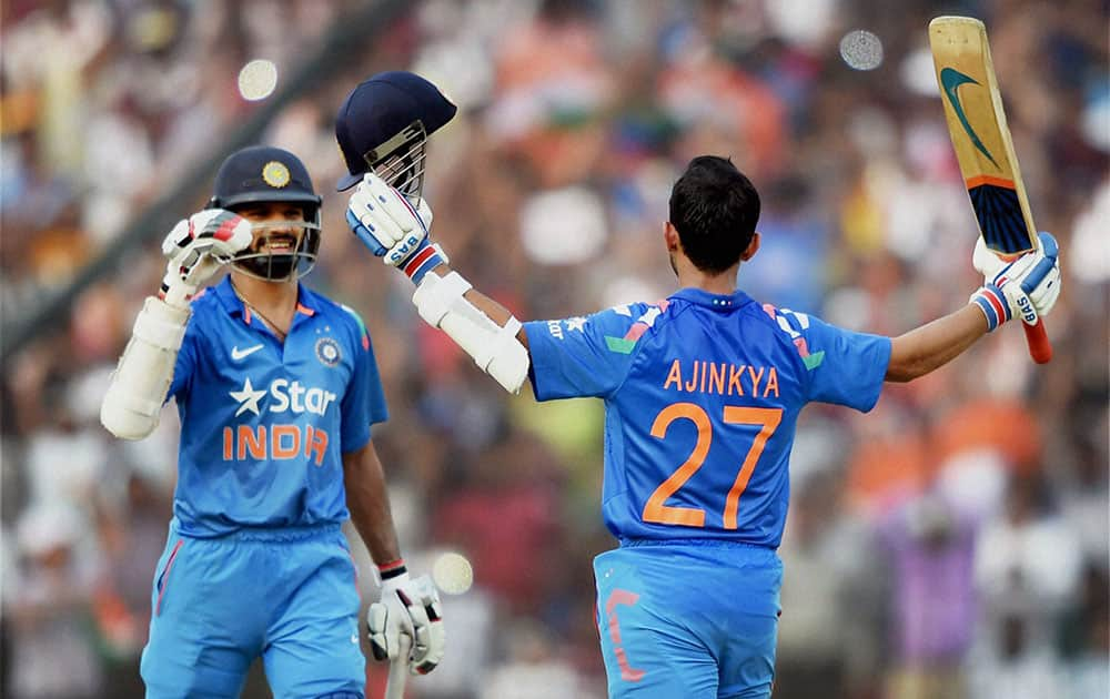  Indian batsman Ajinkya Rahane celebrates his century during 1st ODI match against Sri Lanka in Cuttack.