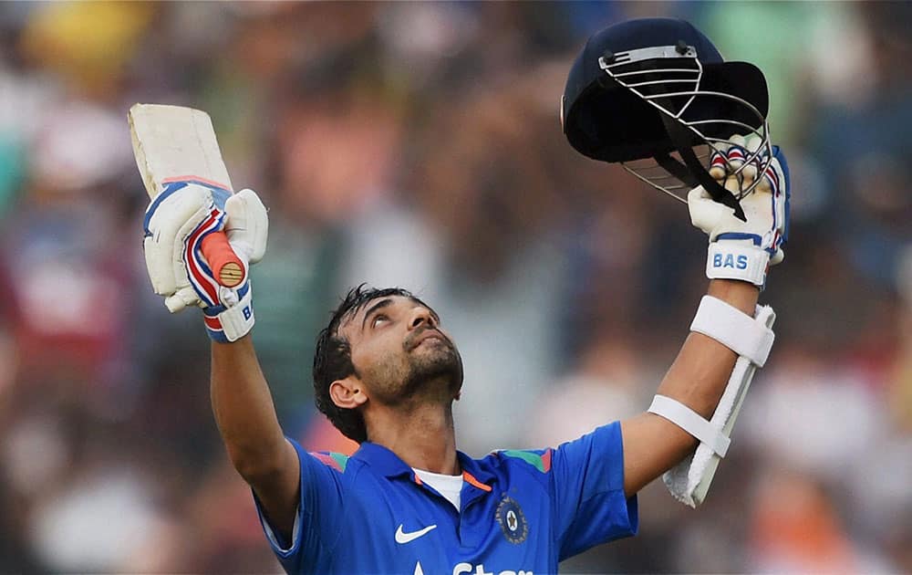 Indian batsman Ajinkya Rahane celebrates his century during 1st ODI match against Sri Lanka in Cuttack.