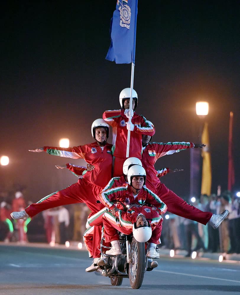 Members of the CRPF women bike rider contingent showing their skill on the occasion of Desh Ke Rakshak the Diamond Jubilee celebrations of Central Reserve Police Force (CRPF) at Rajpath in New Delhi.