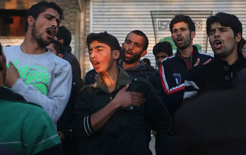 Kashmiri Shiite Muslims beat their chests as they participate in a Muharram procession in Srinagar, India.