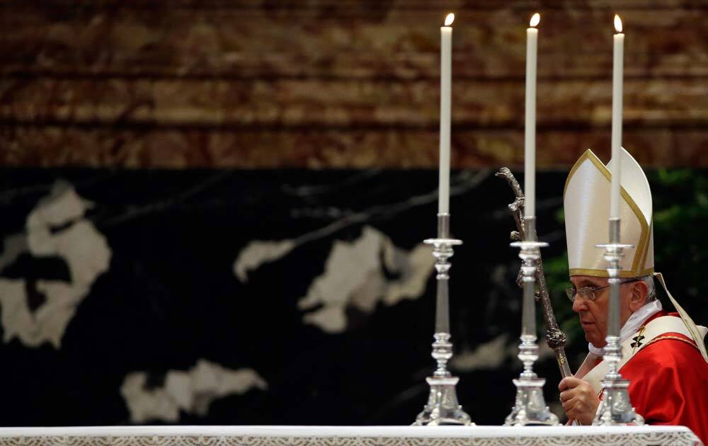 Pope Francis arrives for a Mass for cardinals and bishops who died in the past year, in St. Peter's Basilica at the Vatican.
