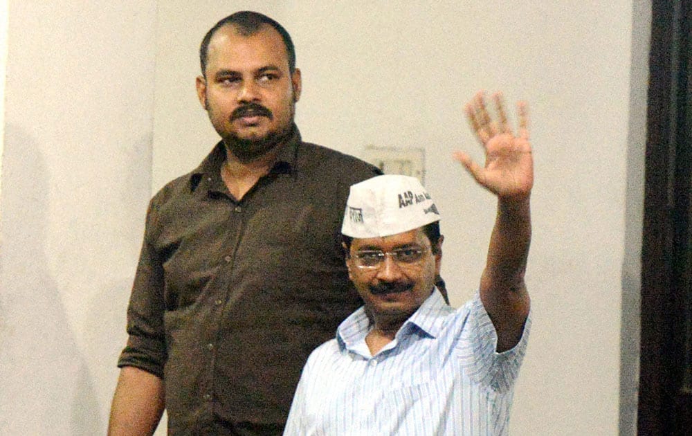 Aam Aadmi Party Chief Arvind Kejriwal leaves after attending a meeting with Lt Governor Najeeb Jung at Raj Niwas in New Delhi.