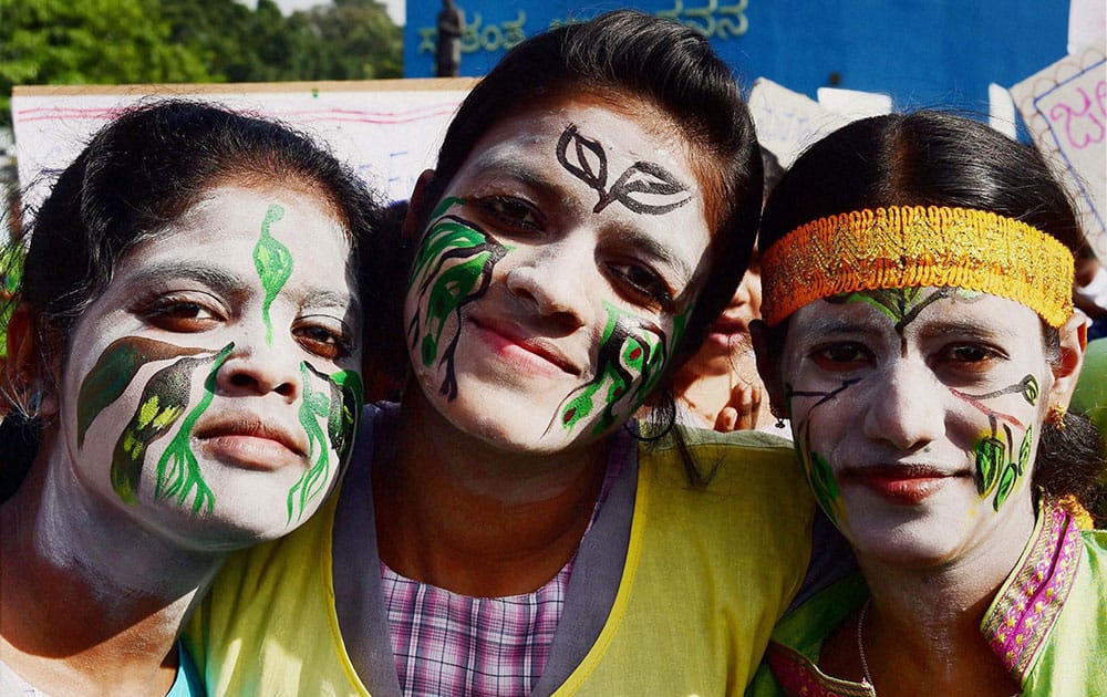 Students with painted faces take part in the Save Enviornment- Save Earth- Save Water awareness rally at Freedom Park in Bengaluru.