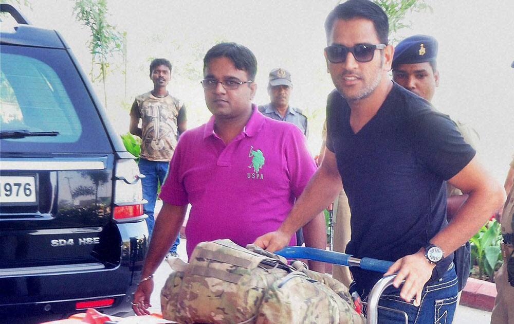 Indian Cricketer Mahendra Singh Dhoni arrives at Birsa Munda International Airport in Ranchi.