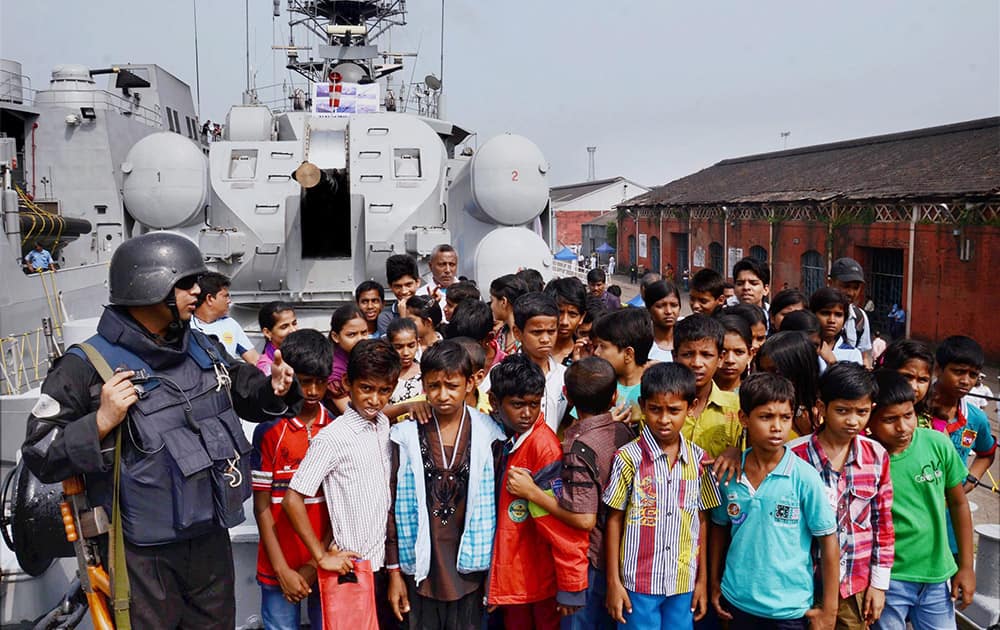 Children visiting INS Khukri at an exhibition organised as part of Navy week celebrations at Khidirpur Dockyard in Kolkata.