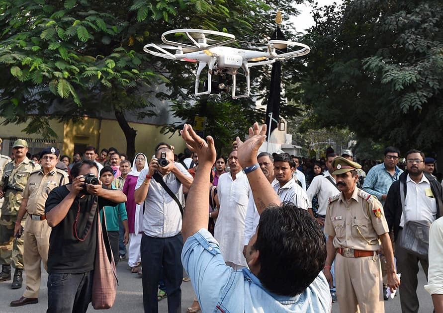 Police using a Drone to keep a watch on a Muharram procession in tension hit Trilokpuri in New Delhi.