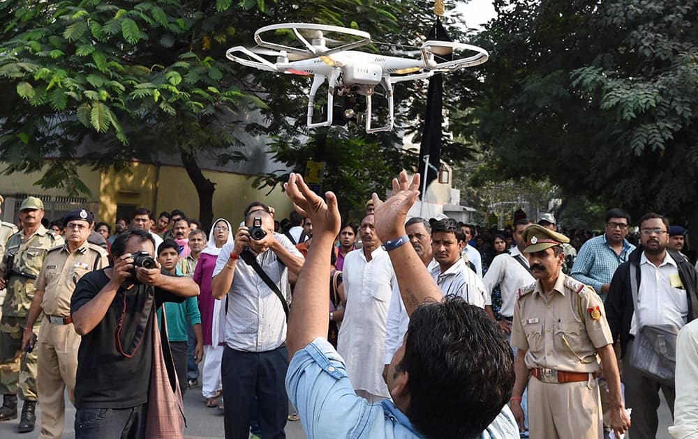 Police using a Drone to keep a watch on a Muharram procession in tension hit Trilokpuri in New Delhi.