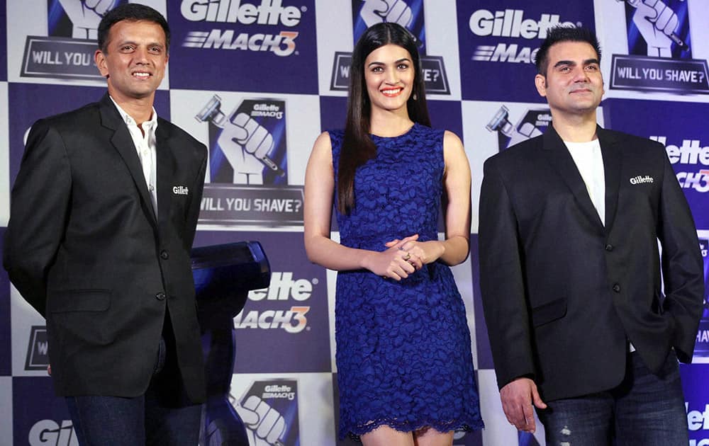 Former cricketer Rahul Dravid, Bollywood actor Arbaaz Khan and actress Kirti Sanon during a promotional event of Gillette in Mumbai.