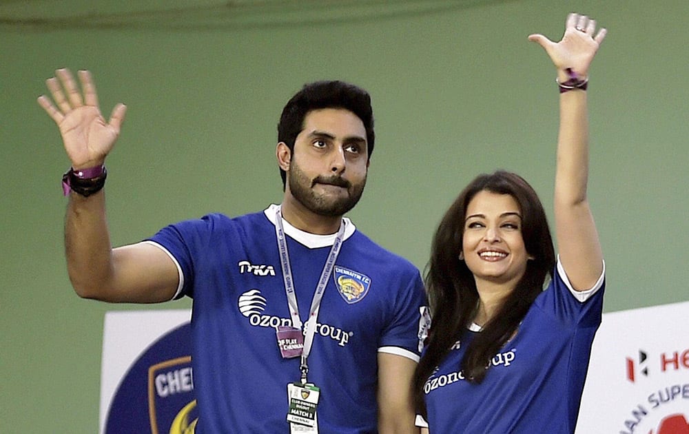 Chennaiyin FC co owner Abhishek Bachchan with his wife Aishwarya Rai during the Indian Super League match between Chennaiyin FC and Atletico De Kolkata in Chennai.