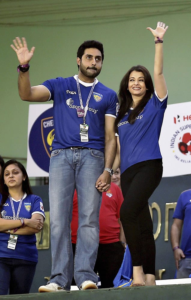 Chennaiyin FC co owner Abhishek Bachchan with his wife Aishwarya Rai during the Indian Super League match between Chennaiyin FC and Atletico De Kolkata in Chennai.