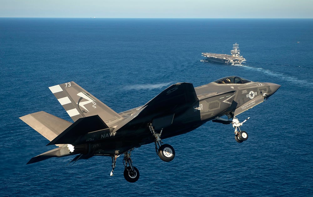 This photo provided by the US Navy shows an F-35C Joint Strike Fighter conducts an approach on the aircraft carrier USS Nimitz.