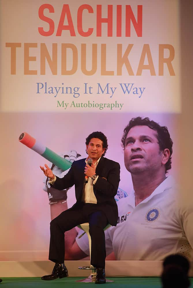 Retired cricket great Sachin Tendulkar speaks after launching his autobiography, 'Playing It My Way,' in Mumbai.