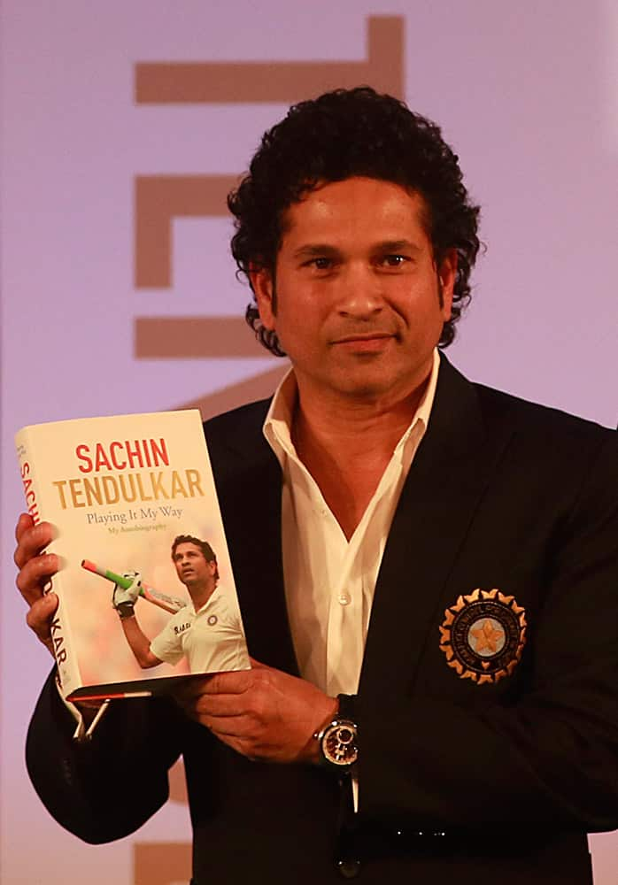 Retired cricket great Sachin Tendulkar launches his autobiography, 'Playing It My Way,' in Mumbai.