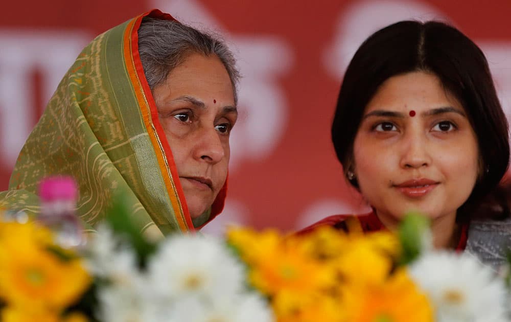 Bollywood actress and lawmaker Jaya Bachchan, left, sits with lawmaker Dimple Yadav at an event of the Samajwadi party in Lucknow, India.