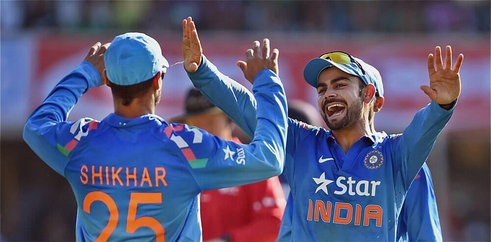 Virat Kohli celebrates the wicket of Sri Lankan batsman Sangakkara during the ODI cricket match in Ahmedabad.