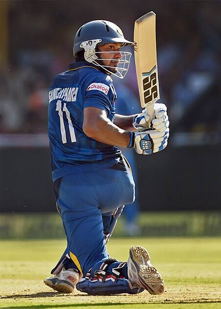 Sri Lankan batsman Sangakara plays a shot during the ODI cricket match against India, in Ahmedabad.