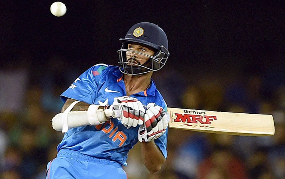 Shikhar Dhawan plays a shot during the 2nd ODI cricket match against Sri Lanka in Ahmedabad.