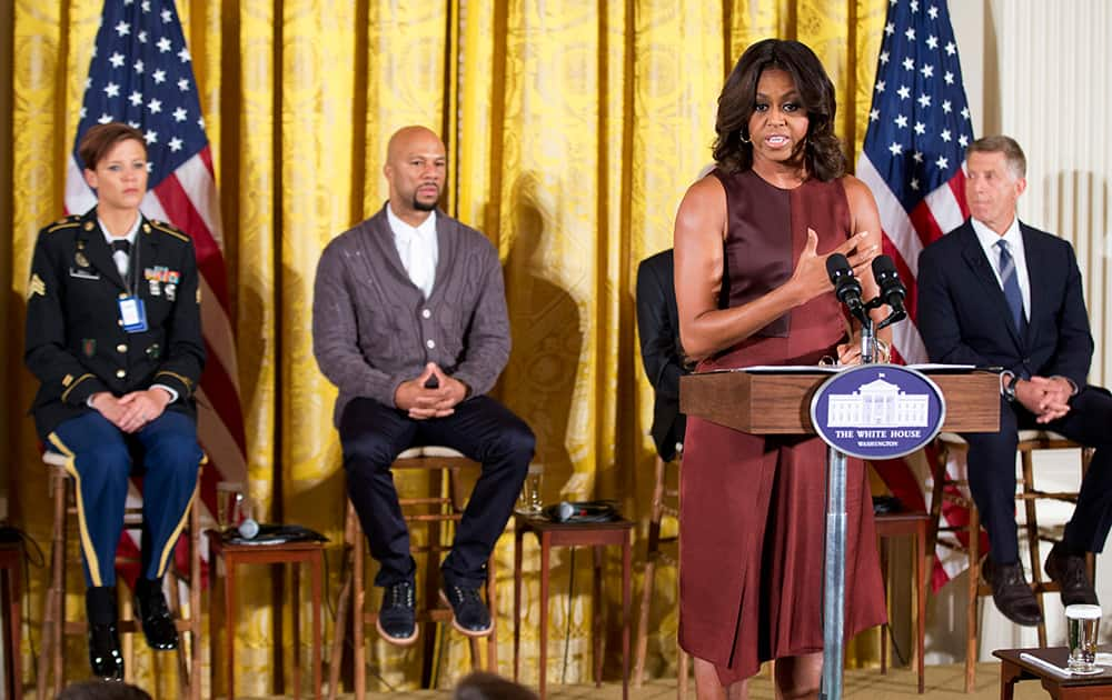 First lady Michelle Obama speaks in the East Room of the White House in Washington, during a special daytime workshop for high school students from military communities in the greater Washington area. 