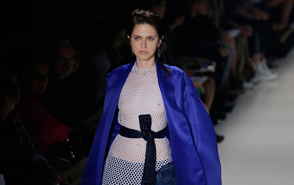 A model wears a creation from the Vitorino Campos Winter collection during the Sao Paulo Fashion Week in Sao Paulo, Brazil.