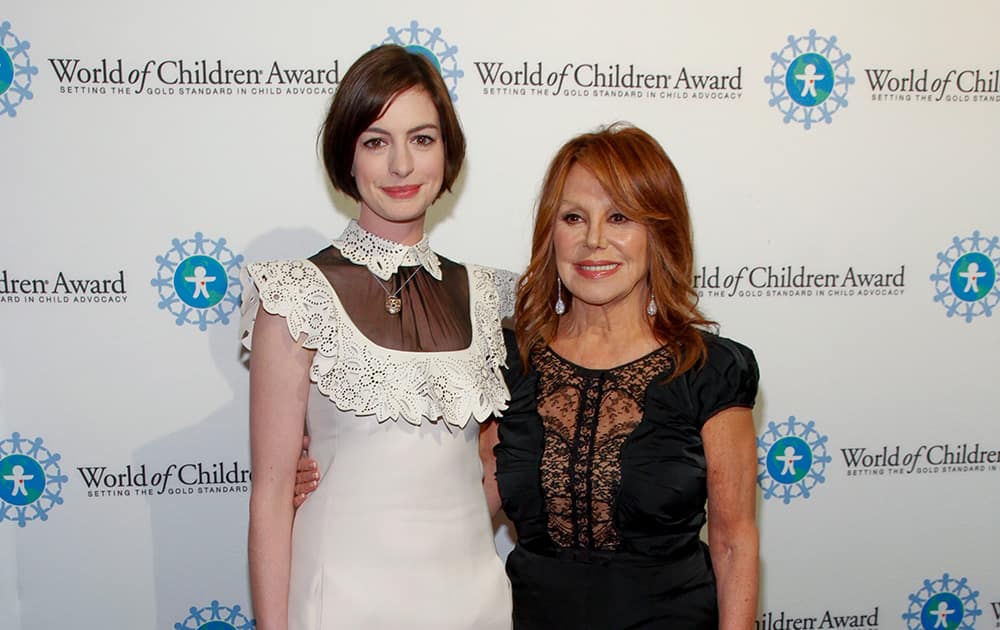 Anne Hathaway and Marlo Thomas, attend the 2014 World of Children Awards at 583 Park Avenue, in New York. 