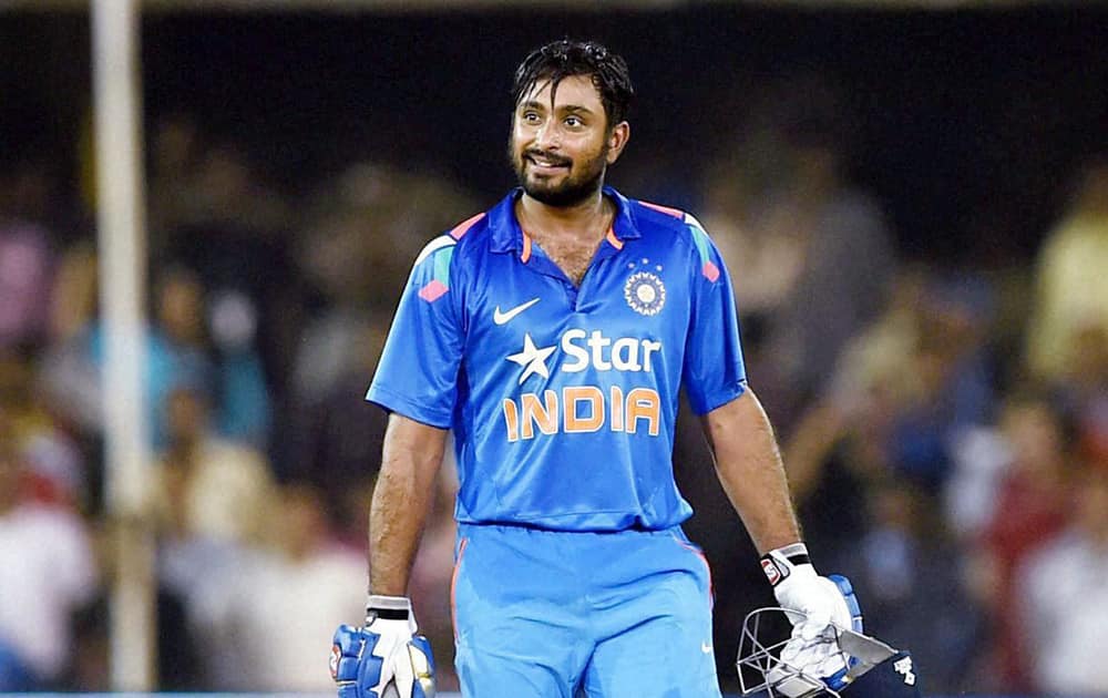 Rayudu reacts after completing his century during the 2nd ODI cricket match against Sri Lanka in Ahmedabad.