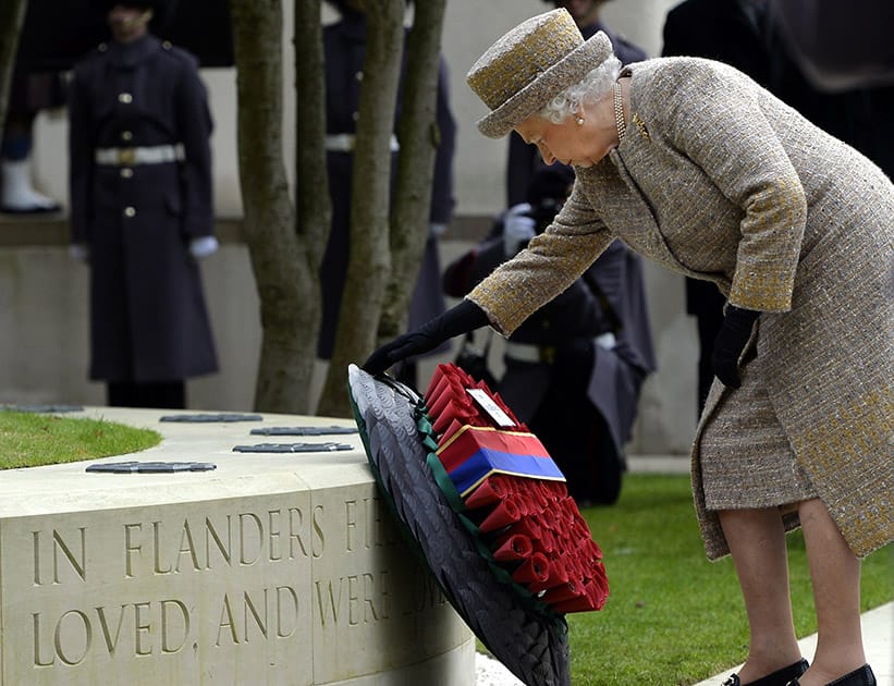 Britains Queen Elizabeth places a wreath during the inauguration of the Flanders Fields Memorial Garden.