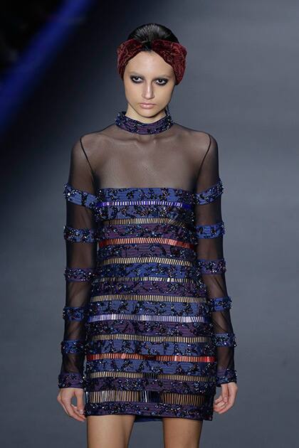 A model wears a creation from the Lino Villaventura Winter collection during the Sao Paulo Fashion Week in Sao Paulo, Brazil.