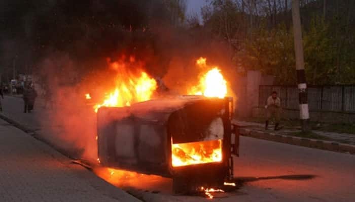 Mob torches CRPF vehicle after two die in Srinagar accident
