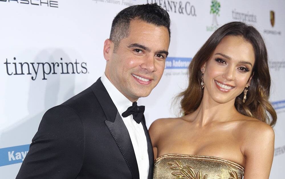 Cash Warren, left, and Jessica Alba arrive at the Third annual Baby2Baby Gala honoring Kate Hudson at The Book Bindery, in Culver City, Calif. 