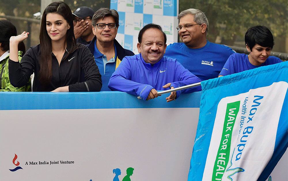 Union Minister for Health and Family Welfare Harsh Vardhan with actors Mandira Bedi and Kriti Sanon flags off Walk for Health, in New Delhi.