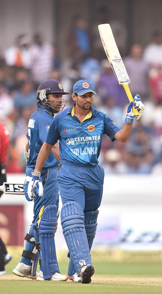 SriLanka’s T Dilshan celebrates his fifty runs against India during 3rd ODI cricket match in Hyderabad.