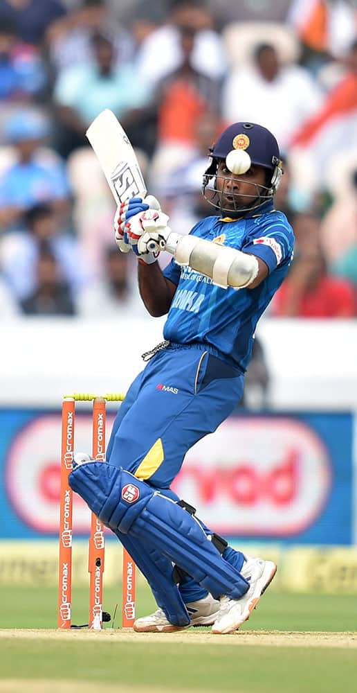 SriLanka’s Mahela Jayawardene plays a shot against India during 3rd ODI cricket match in Hyderabad.