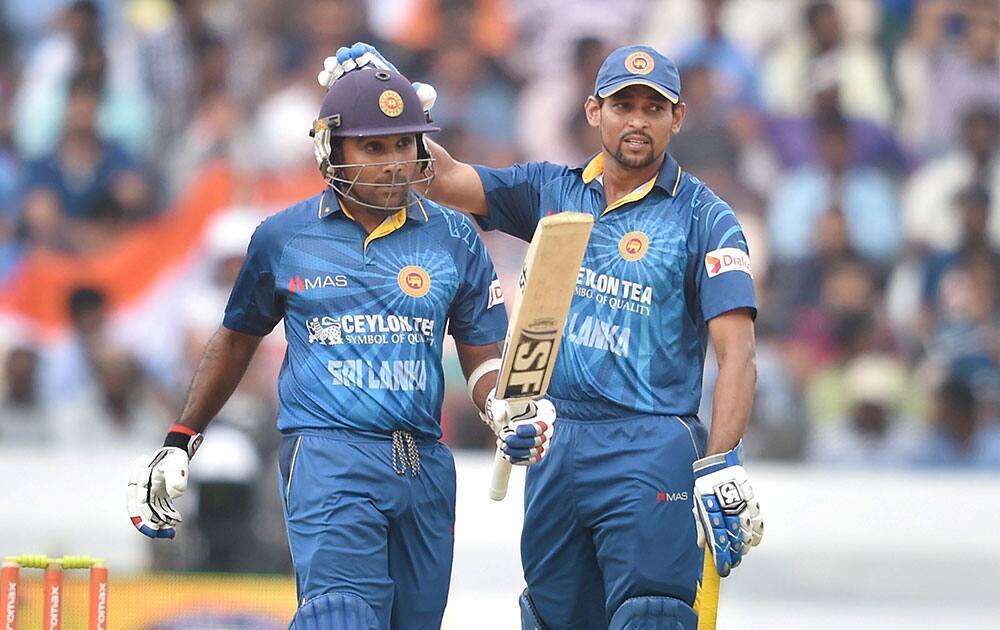 SriLanka’s Mahela Jayawardene celebrates his fifty runs against India during 3rd ODI cricket match in Hyderabad.