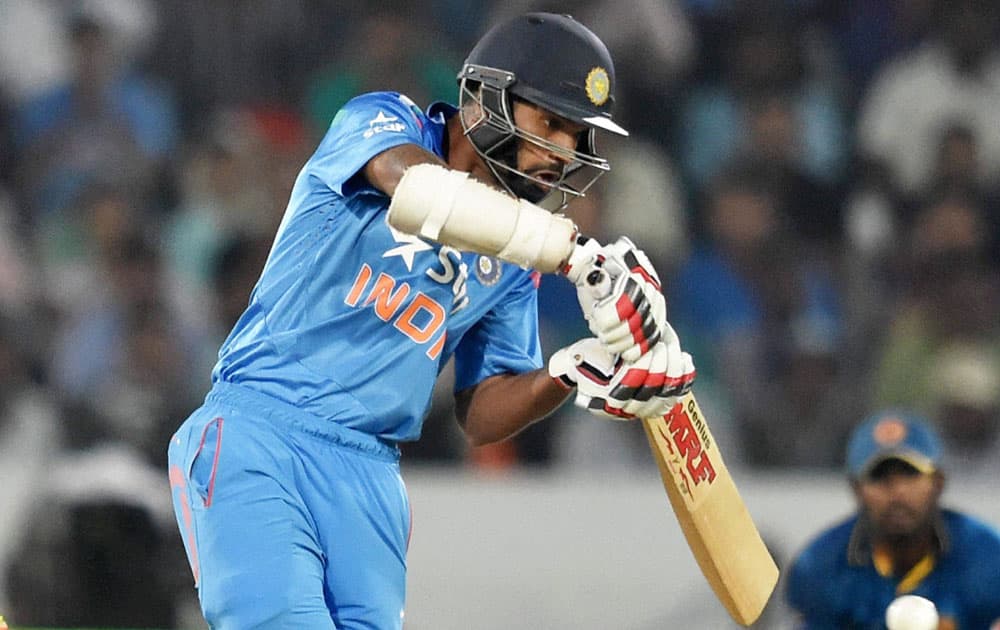 Shikhar Dhawan plays a shot against Sri Lanka in the third ODI in Hyderabad 