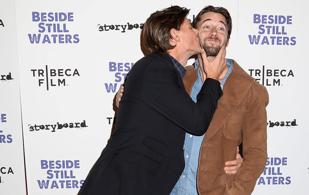 Filmmaker Chris Lowell, left, and actor Ryan Eggold attend the premiere of `Beside Still Waters` at the Sunshine Landmark Theater  in New York.